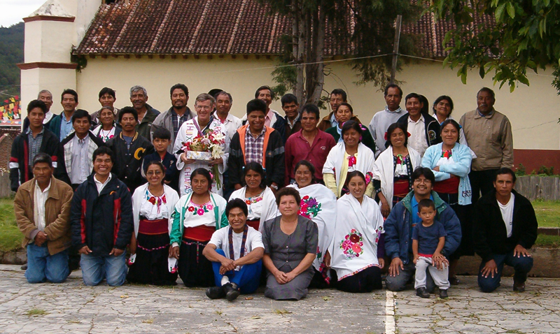 Huixtan cd Felipes qtn 053.jpg - Pictured is Father Henry McLauglin with some of his congregation in Mexico.